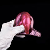 Close-up of magenta ribbed fantasy sleeve extender with open tip and base