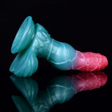 Blue tentacle-like fins and pink tip on fantasy dog alien sex toy, curved body