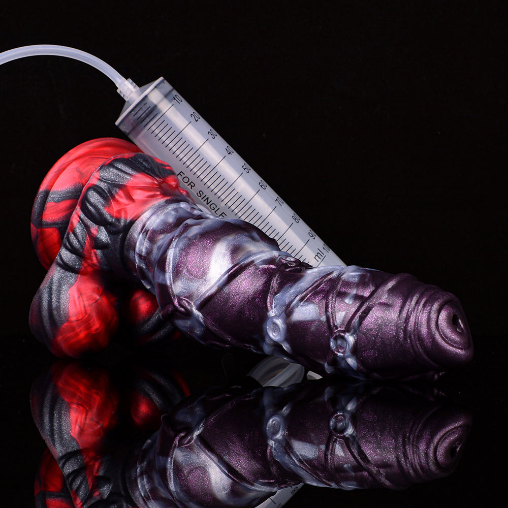 Alien-themed squirting dildo with clear cum tube and scale ruler detail
