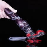Close view of purple body and red base with clear tube attached