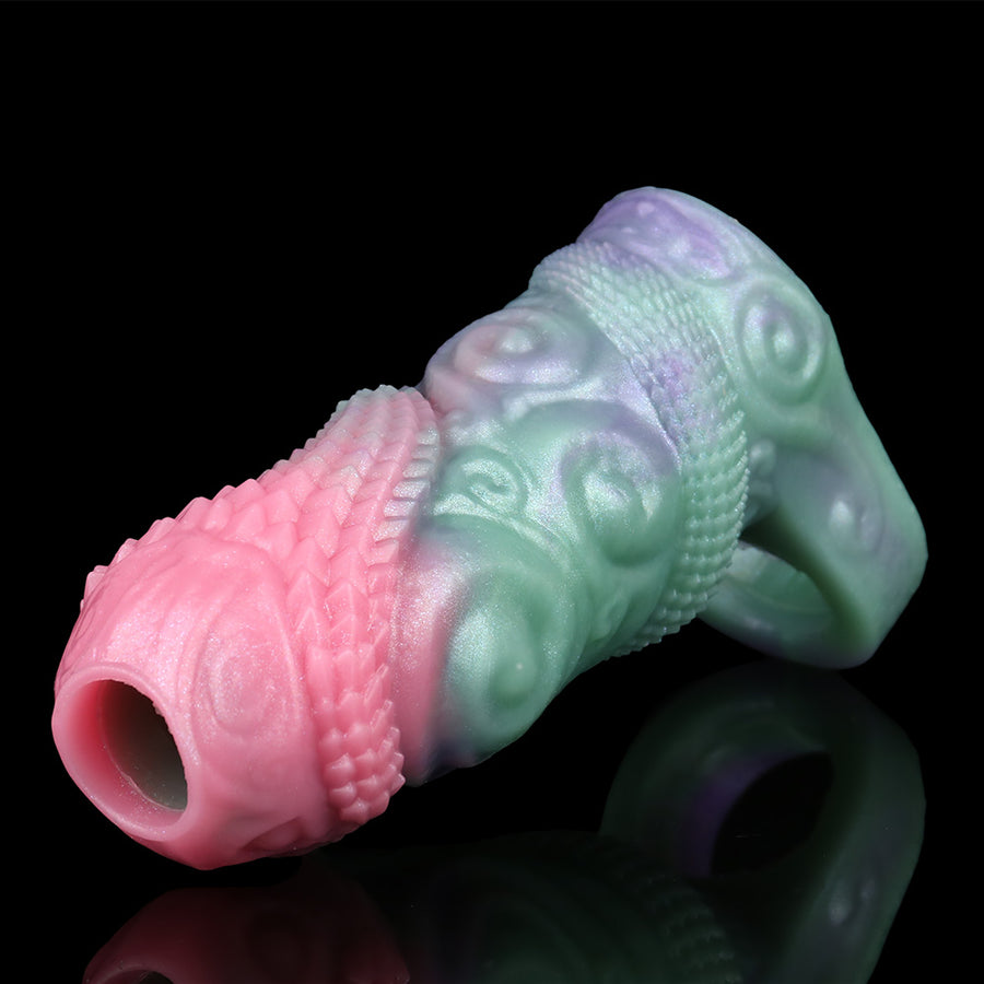 Pastel silicone alien sleeve extender with pink cuff and mint open ring end