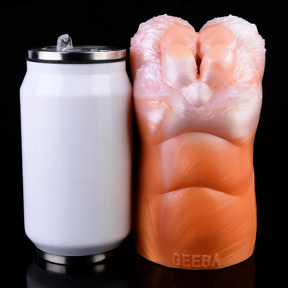 Dual-hole canine fleshlight beside white canister; pink and orange textured body