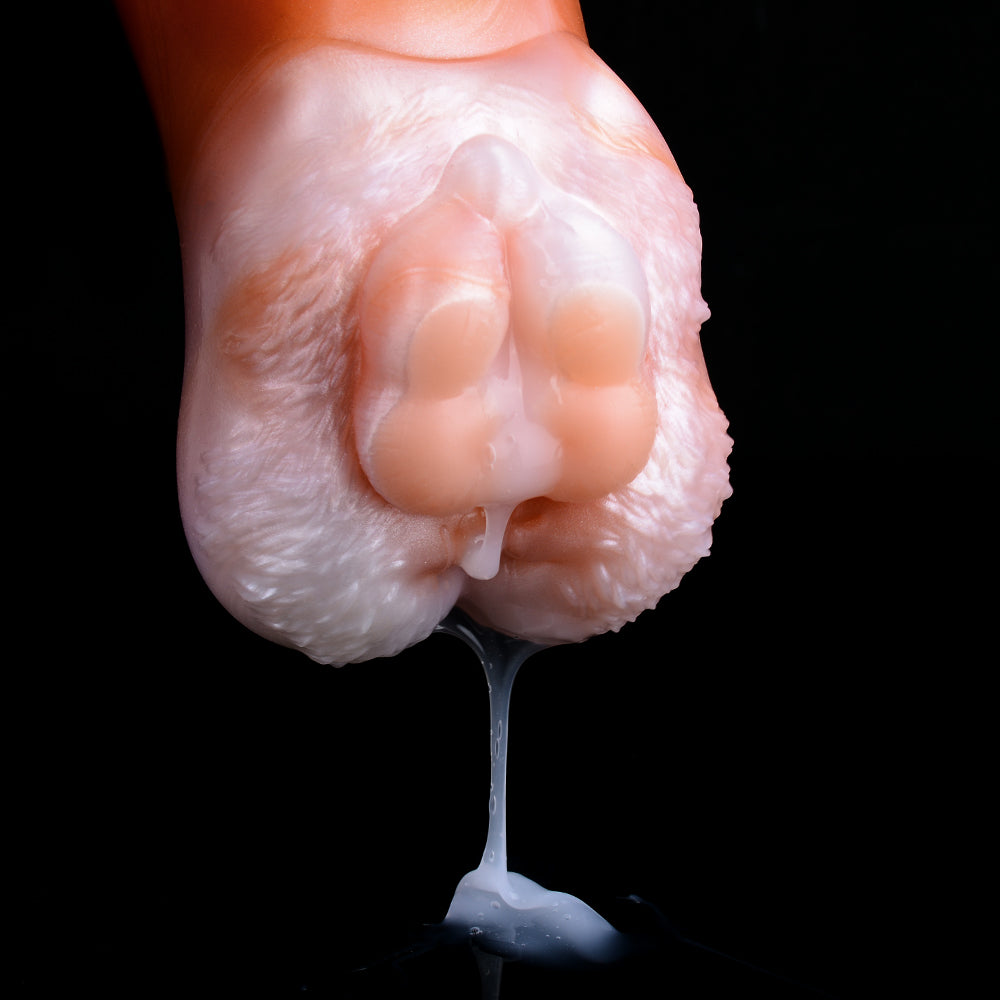 Fleshlight end view with two openings, pale pink textured surface and inner channels