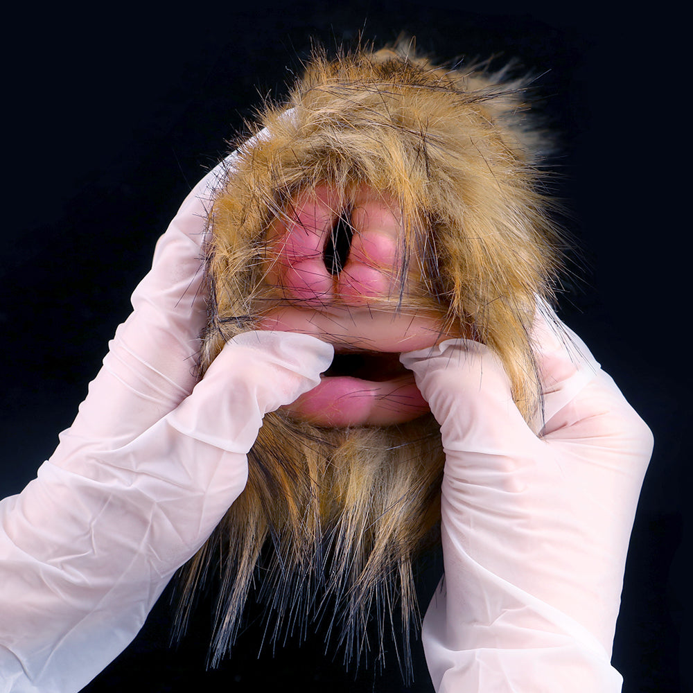 Faux-fur dual-hole stroker, two dark openings framed by thick fur