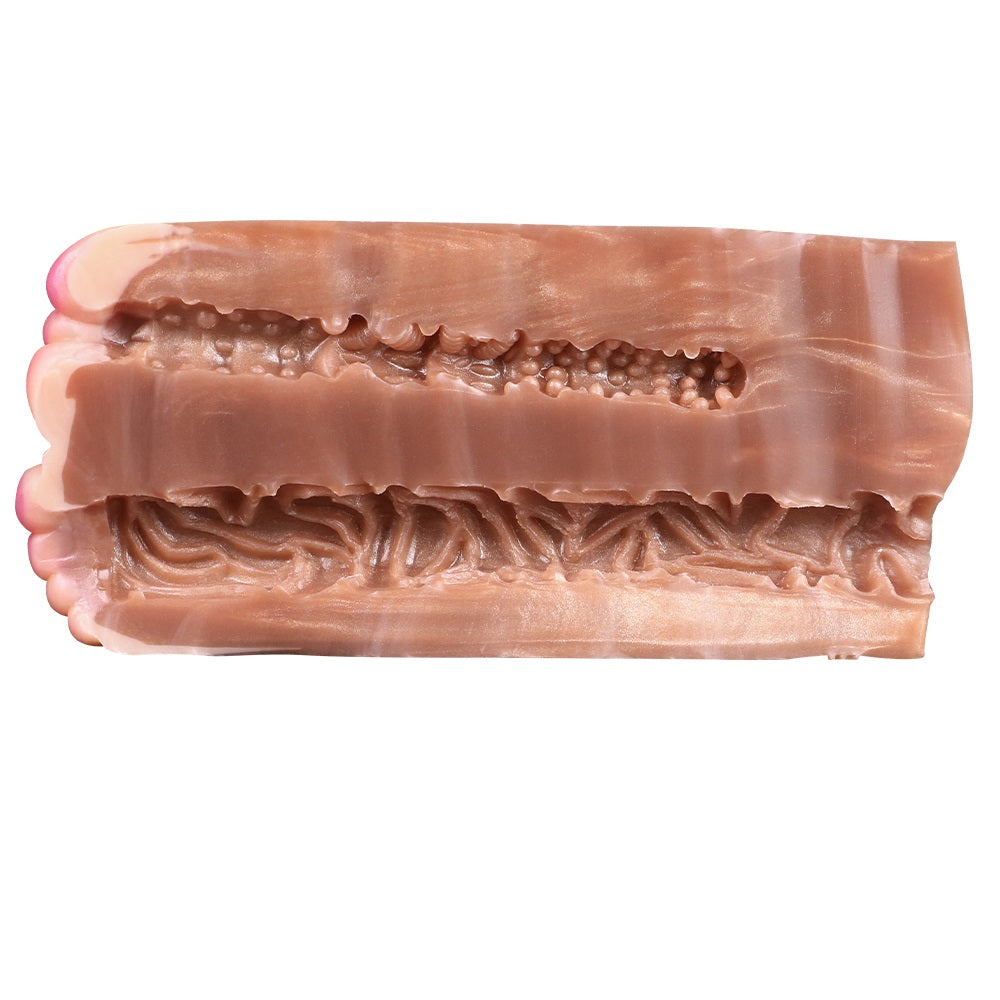 Dual-hole stroker insert with ridged texture and two cavities (side view)