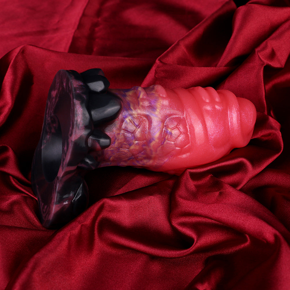 Dragon knot anal plug in glossy pink and purple with textured black knot detail