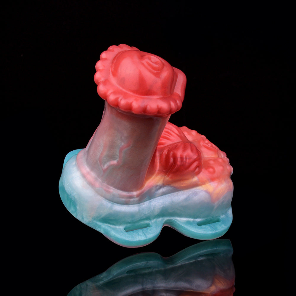 Horse cock grinder toy, angled view; red top and blue base