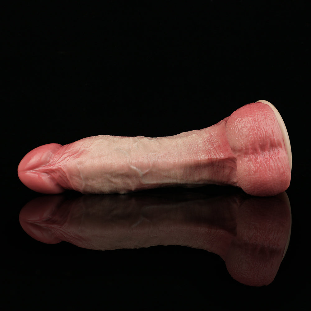 Realistic silicone dildo, pink textured shaft and round glans, side view