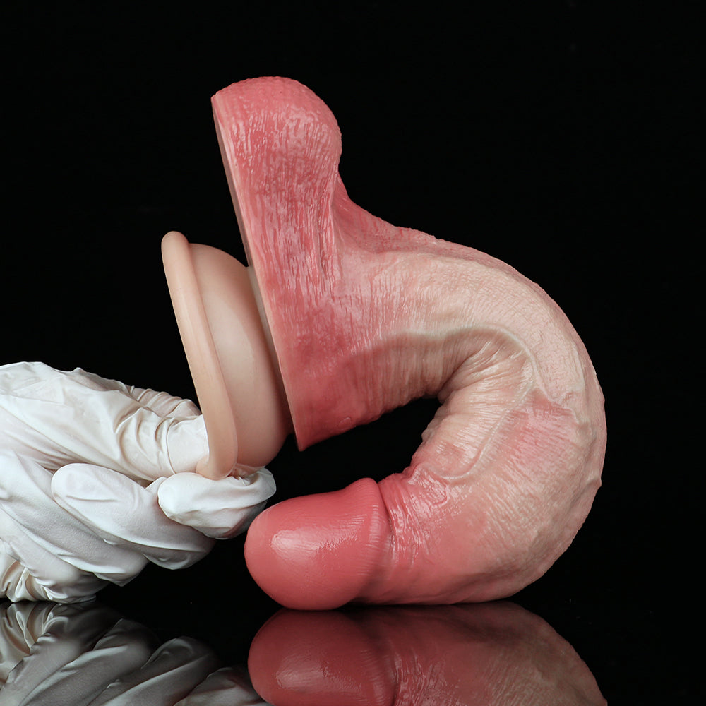 Realistic silicone dildo with flared base and ball end, pink textured surface