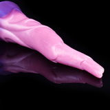 Pink fantasy butt plug dildo close-up of the smooth, ridged shaft