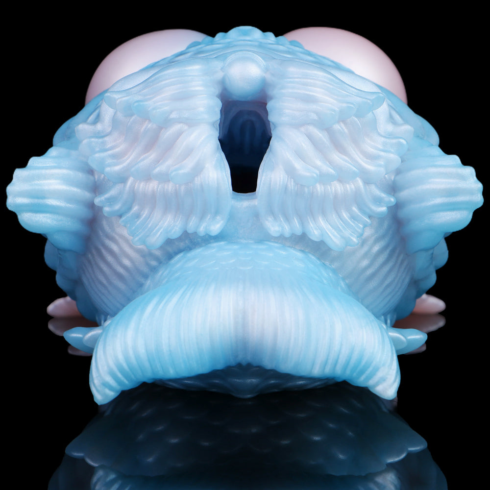 Mermaid fantasy masturbator front view: dark opening with curled fin texture