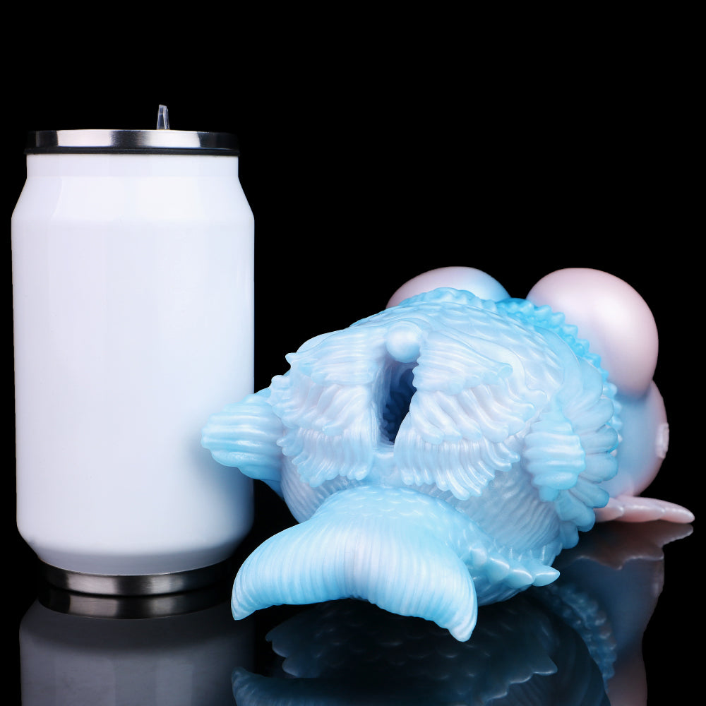 Mermaid fantasy masturbator: light blue fish body with pale pink end cap