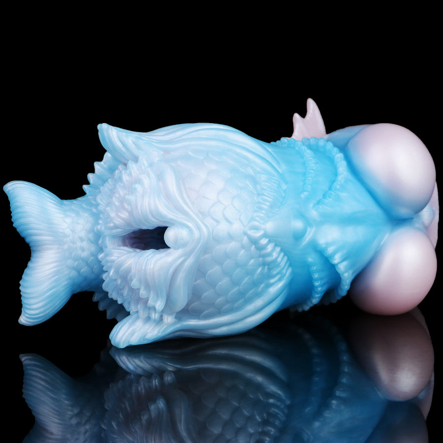 Side view of light blue fish masturbator with fins and pink end cap