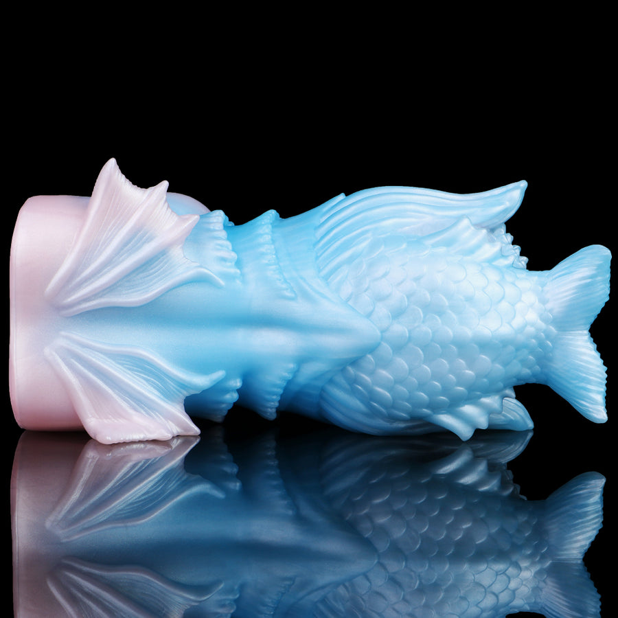 Long fish-shaped masturbator in light blue with textured scales and pink base ends