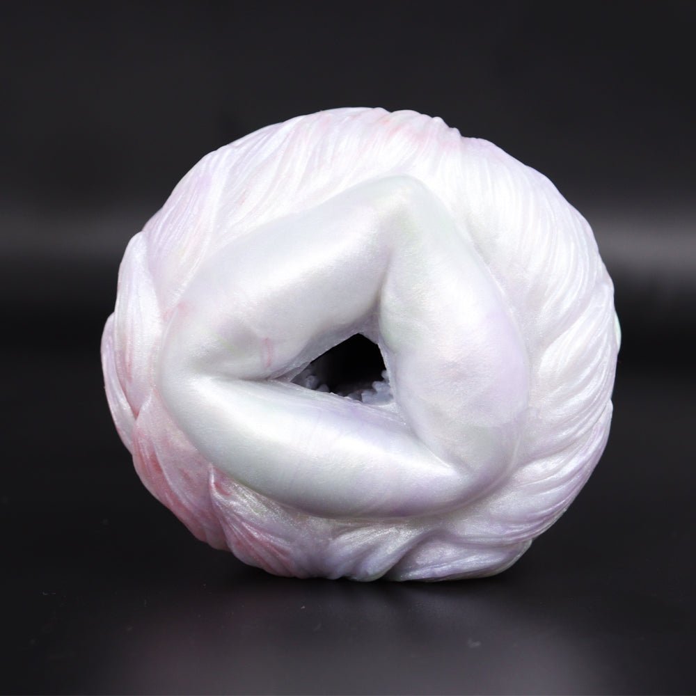 White fantasy masturbator with subtle pink marks, front view of coiled opening