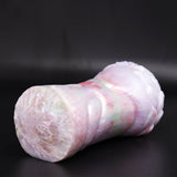 White and pastel-striped fantasy masturbator, detailed end view of coiled form