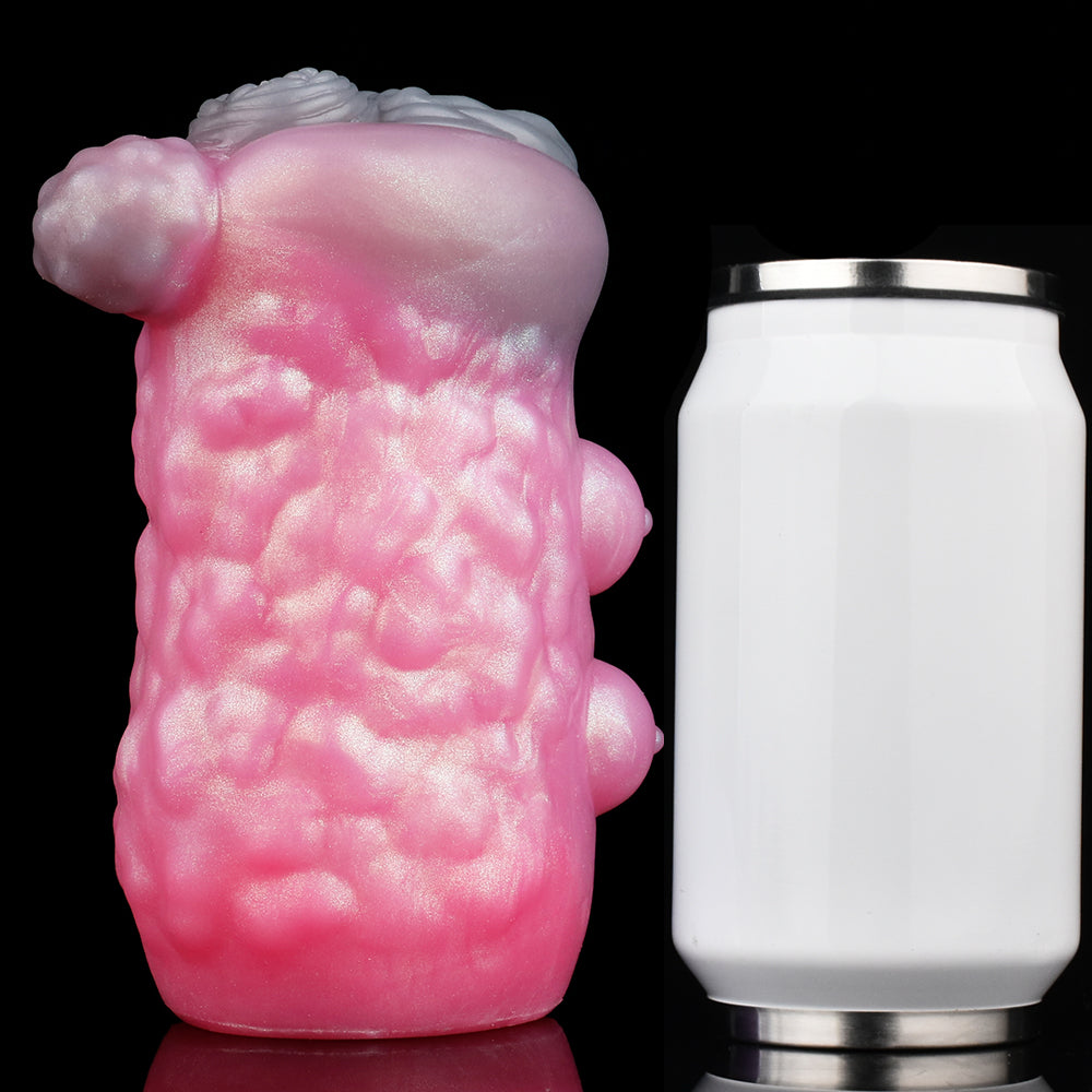 Pink animal-themed sex toy front view with textured surface and three rounded protrusions