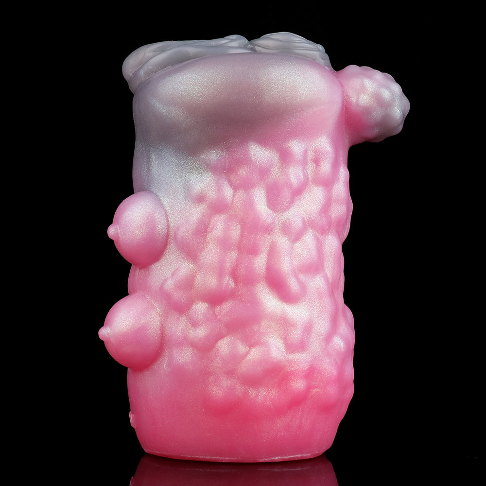 Pink animal-themed sex toy side/back with textured body and two rounded bumps