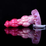Minotaur squirting dildo, pink-purple, curved side view with coiled clear tube