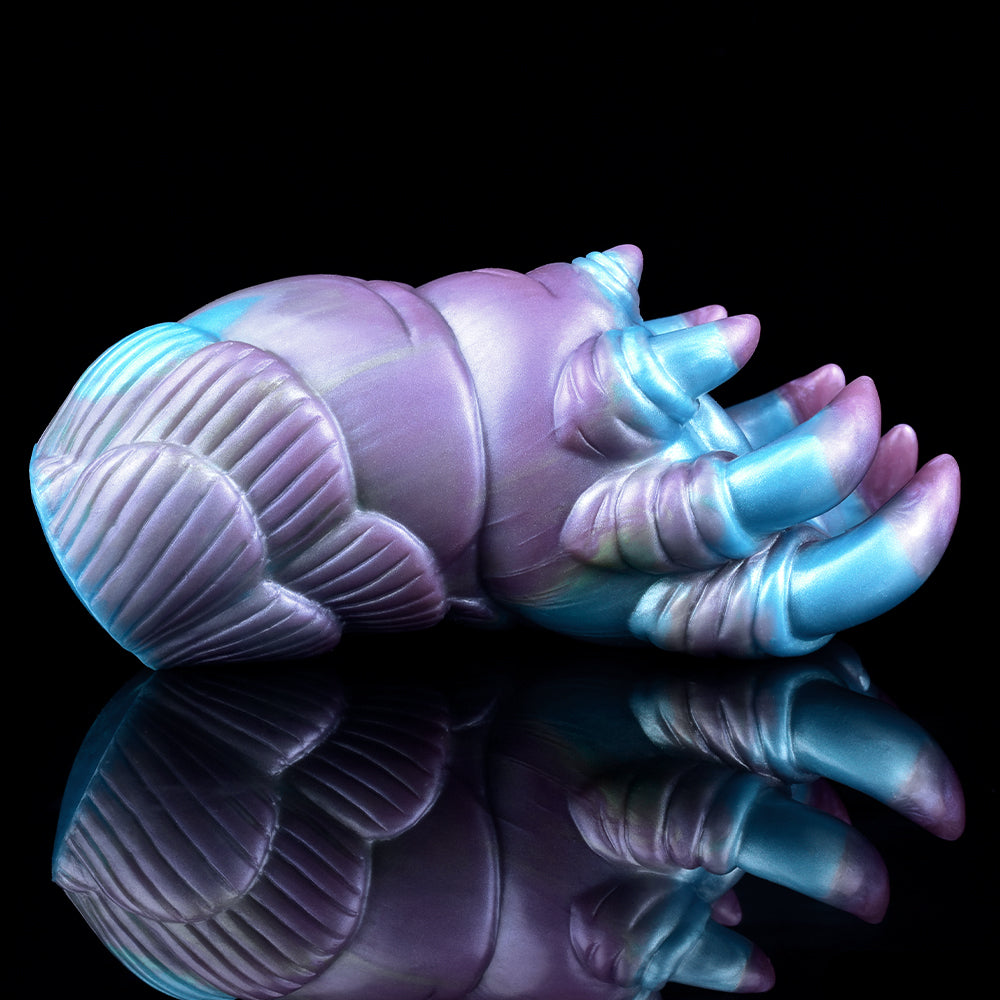 Alien claw stroker side view: ribbed blue-purple base and clawed hand
