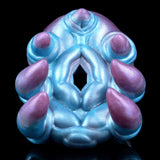 Alien claw stroker close-up: blue-purple body with five rounded claw fingers