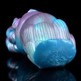 Alien claw stroker close-up of ribbed base, blue end cap and claw accents