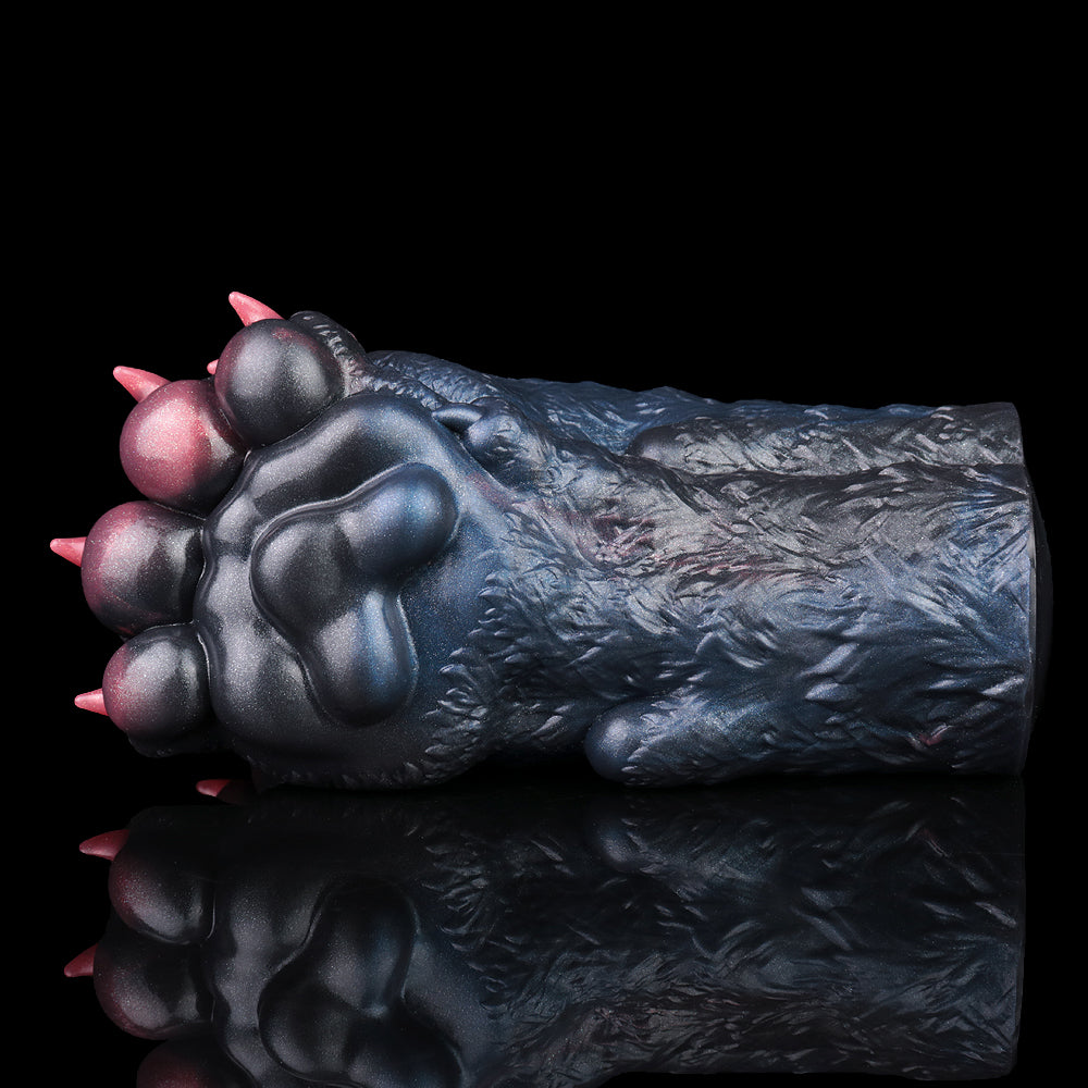 Monster paw pocket pussy sleeve, angled view with dark blue fur texture and pink toes