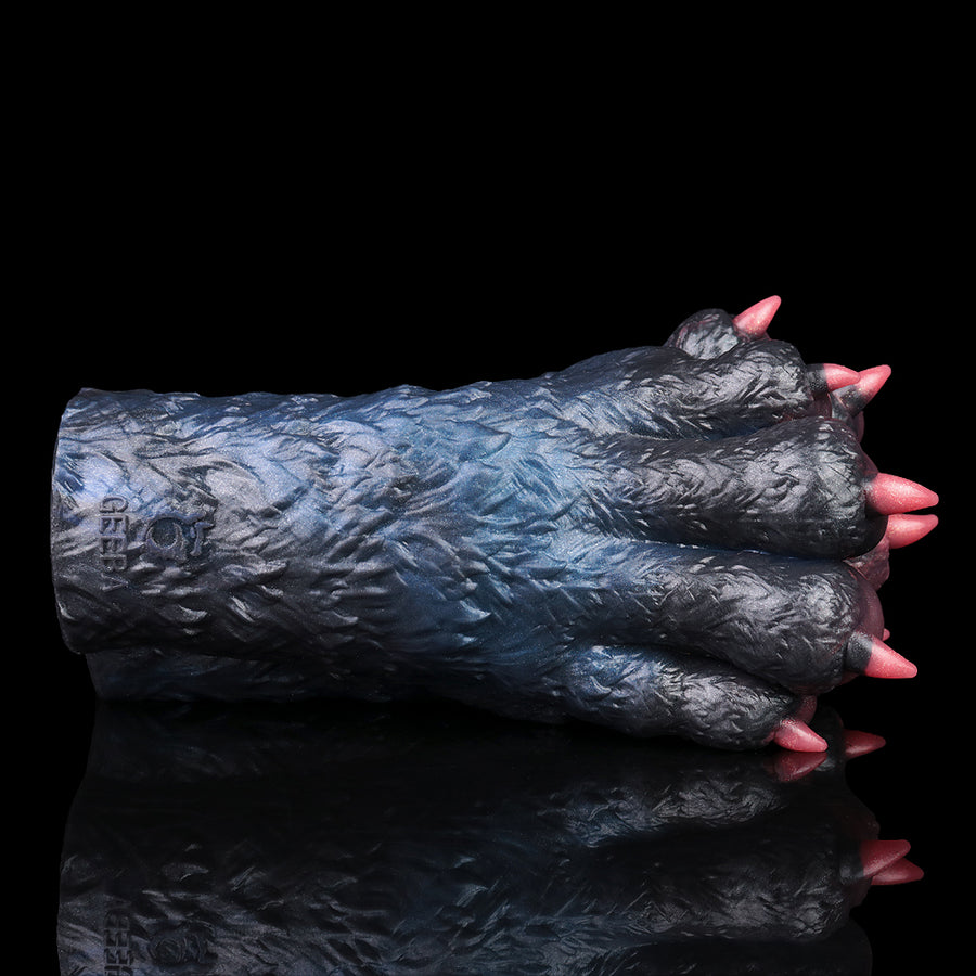 Animal-themed pocket masturbator side profile with textured dark blue body and pink claws