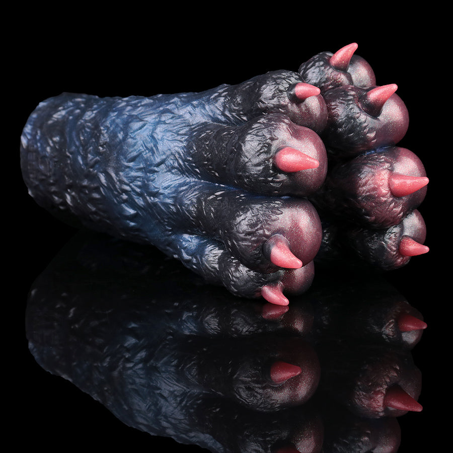 Animal-themed pocket masturbator with dark blue textured body and pink paw bumps