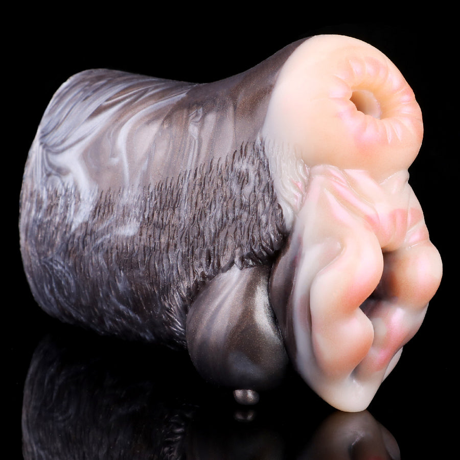 Animal-shaped two-hole stroker with textured gray faux-fur body and pink molded openings