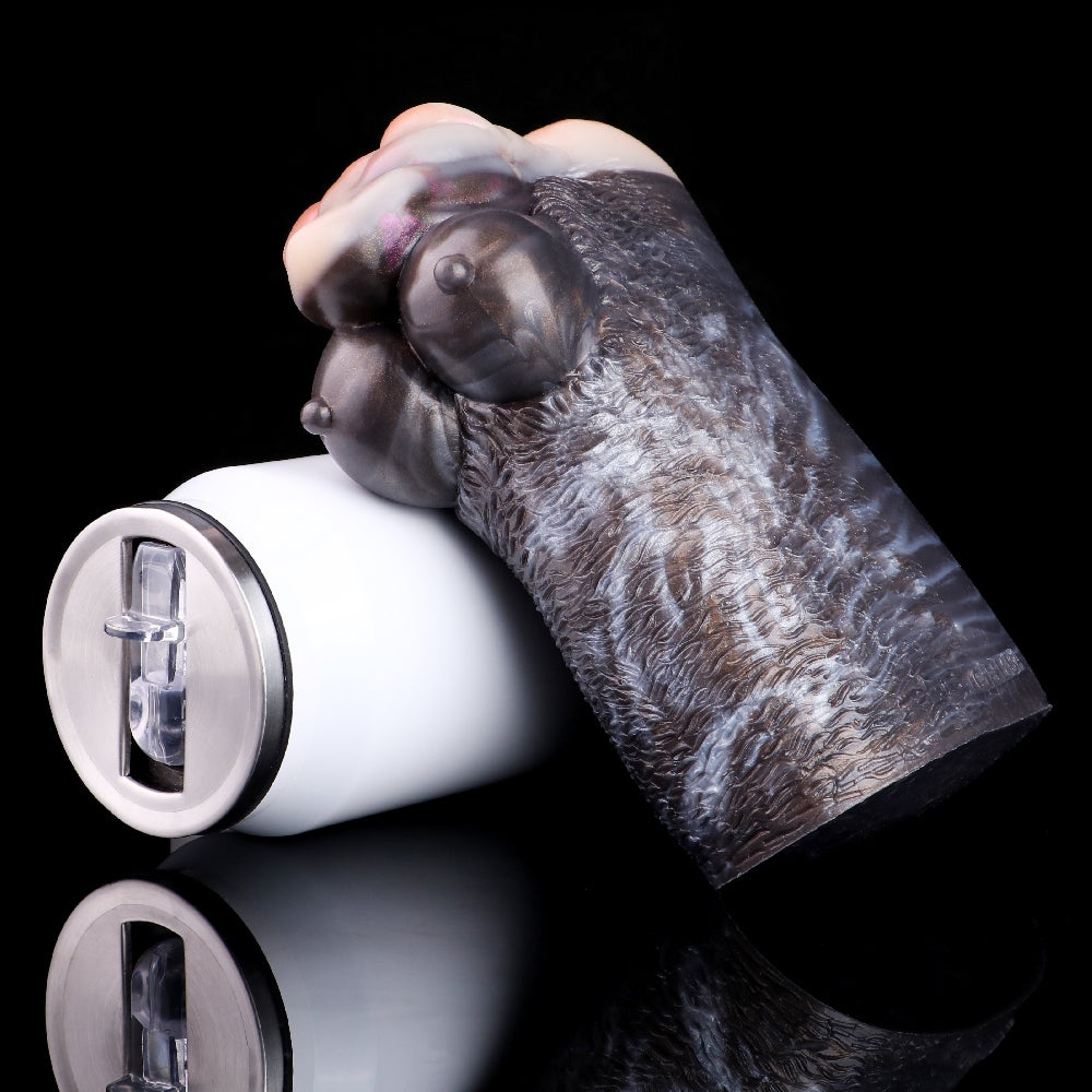 Two-hole goat masturbator with dark textured body and clear suction-fit insert