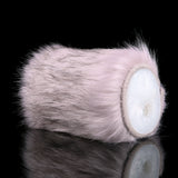 Side view of furry two-hole stroker with oval opening