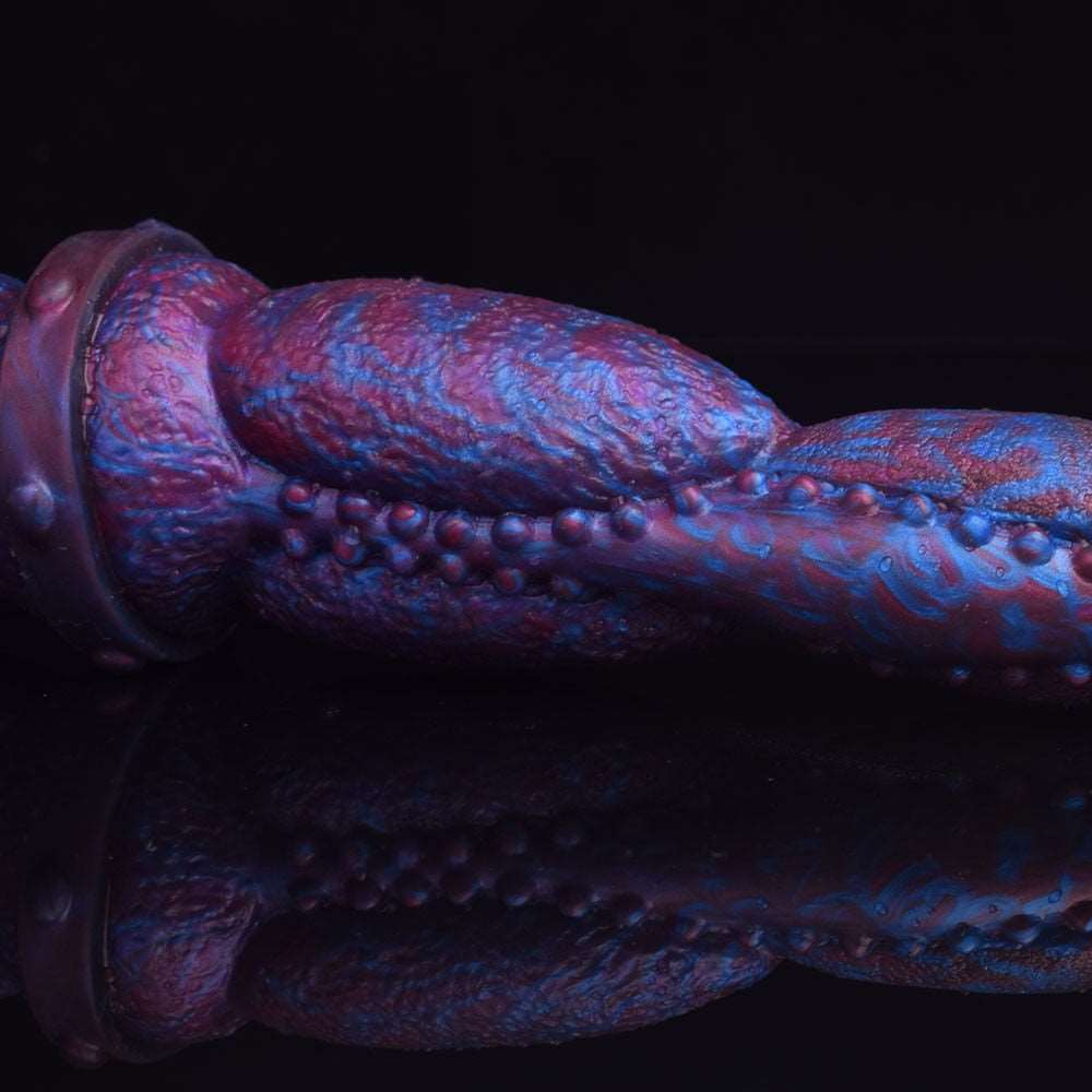Close-up of double-ended equine dildo: purple-blue texture with bead-like bumps