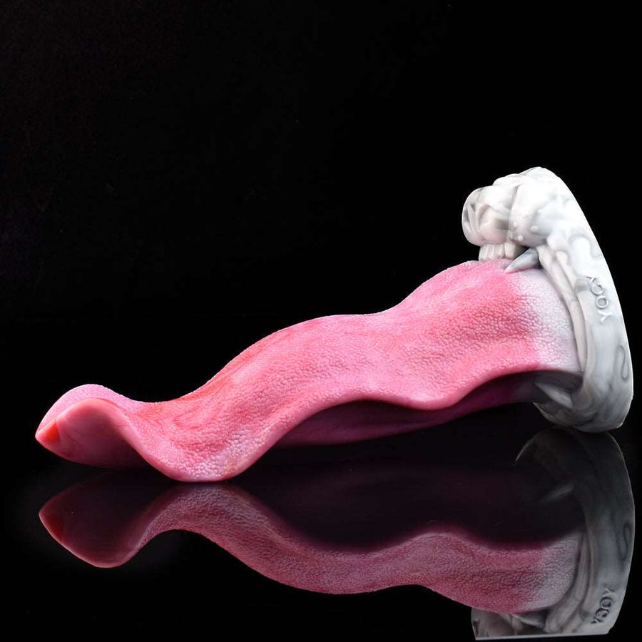 Pink textured wolf-tongue dildo side profile with curled tip and white base