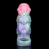 Front view of alien extender sleeve, pink cap and aqua-purple textured body
