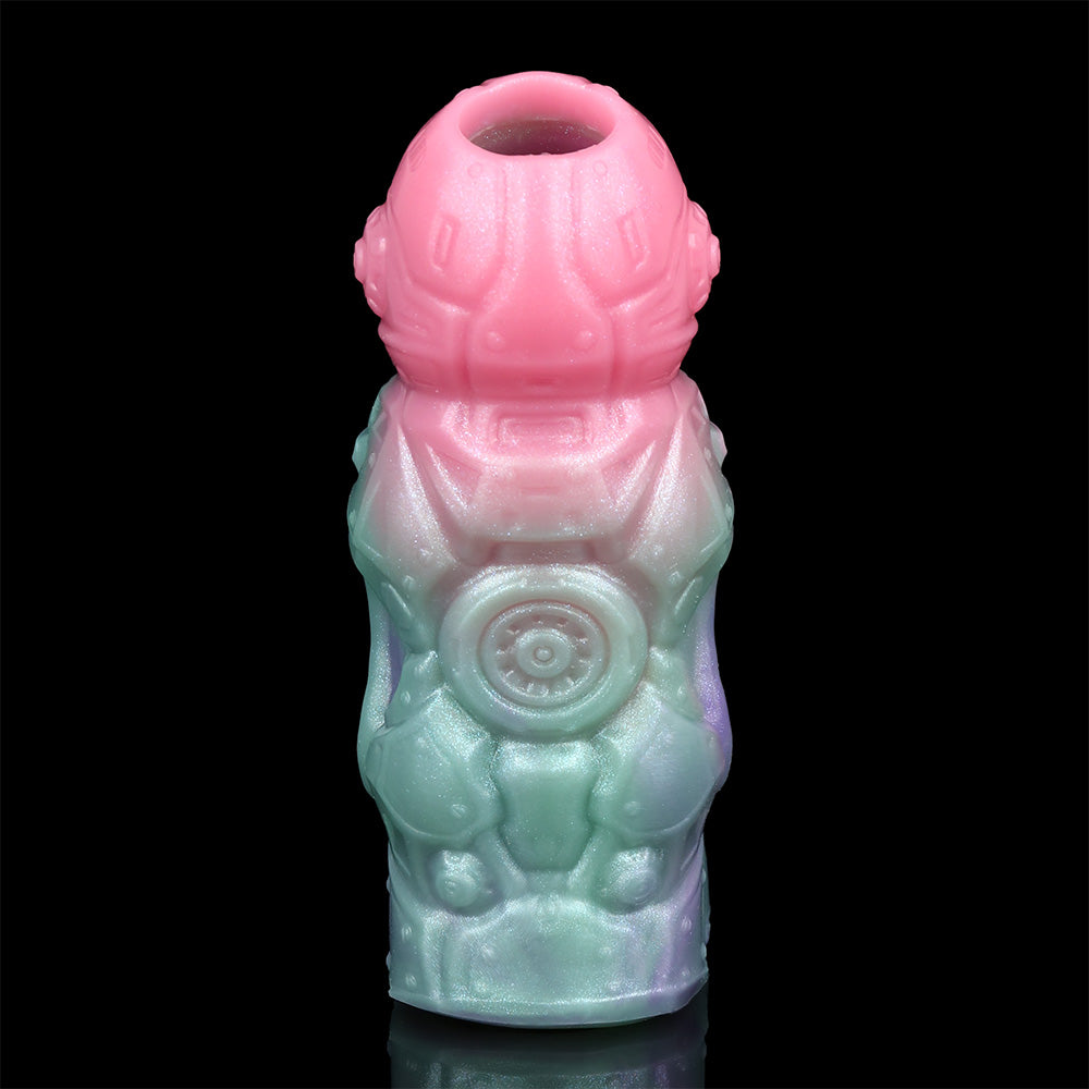 Top opening of alien extender sleeve, pink rim over aqua body with spiral emblem