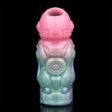 Top opening of alien extender sleeve, pink rim over aqua body with spiral emblem