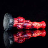 Side view: red muscular horse-style dildo with gray suction base and knot