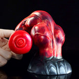 Close-up of base and knot: red muscular horse-style dildo with gray holder