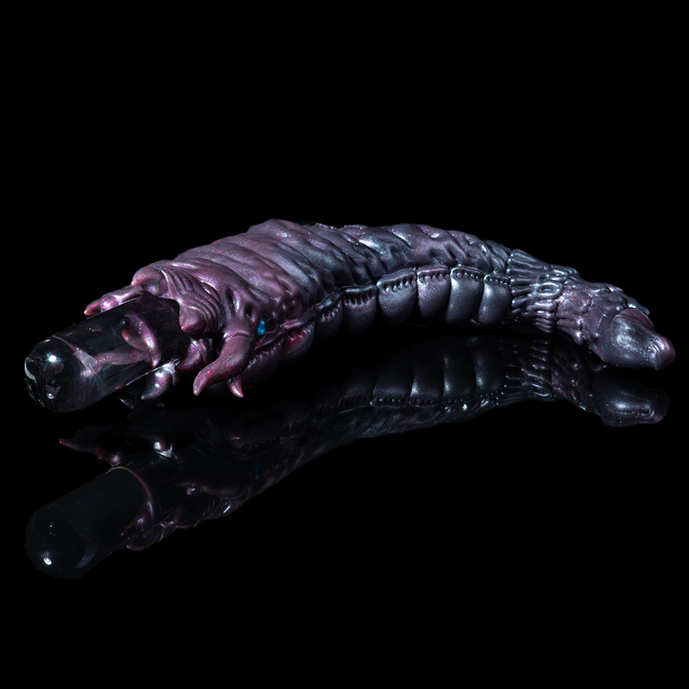 Metallic purple creature hand-and-arm figure with textured clawed fingers