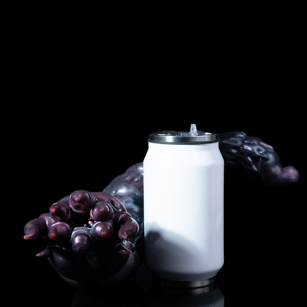 Metallic purple creature hand holding a white cylindrical can with silver top