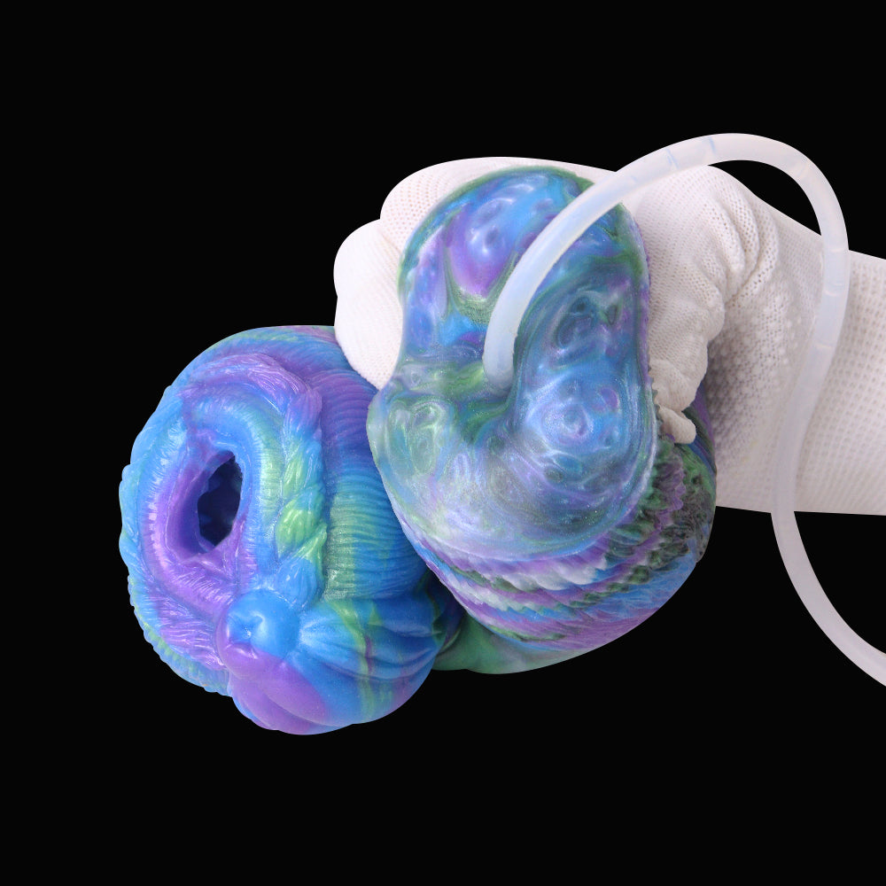 Rainbow harpy fantasy masturbator with attached tubing, open end visible