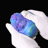 Rainbow harpy fantasy masturbator, open mouth-like opening under white gloves