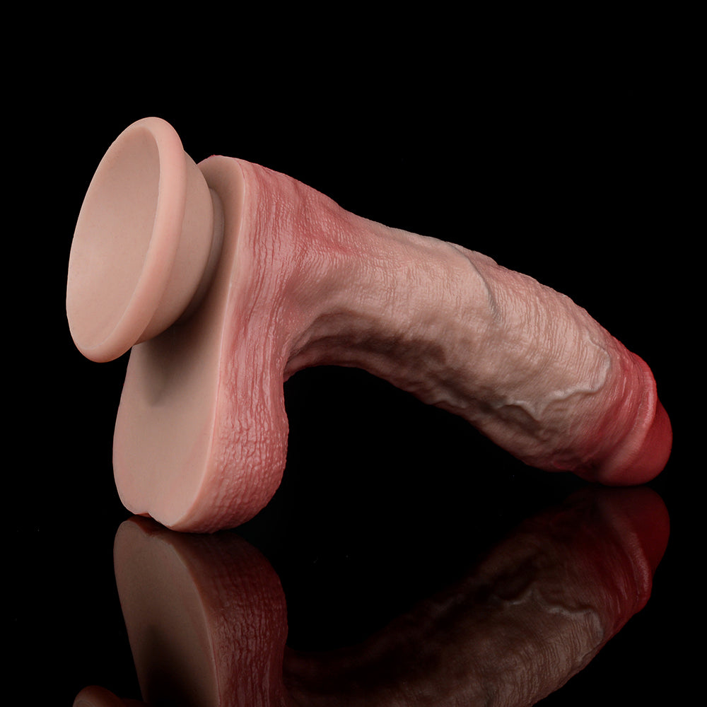 Pink dildo with balls and ring base, angled view