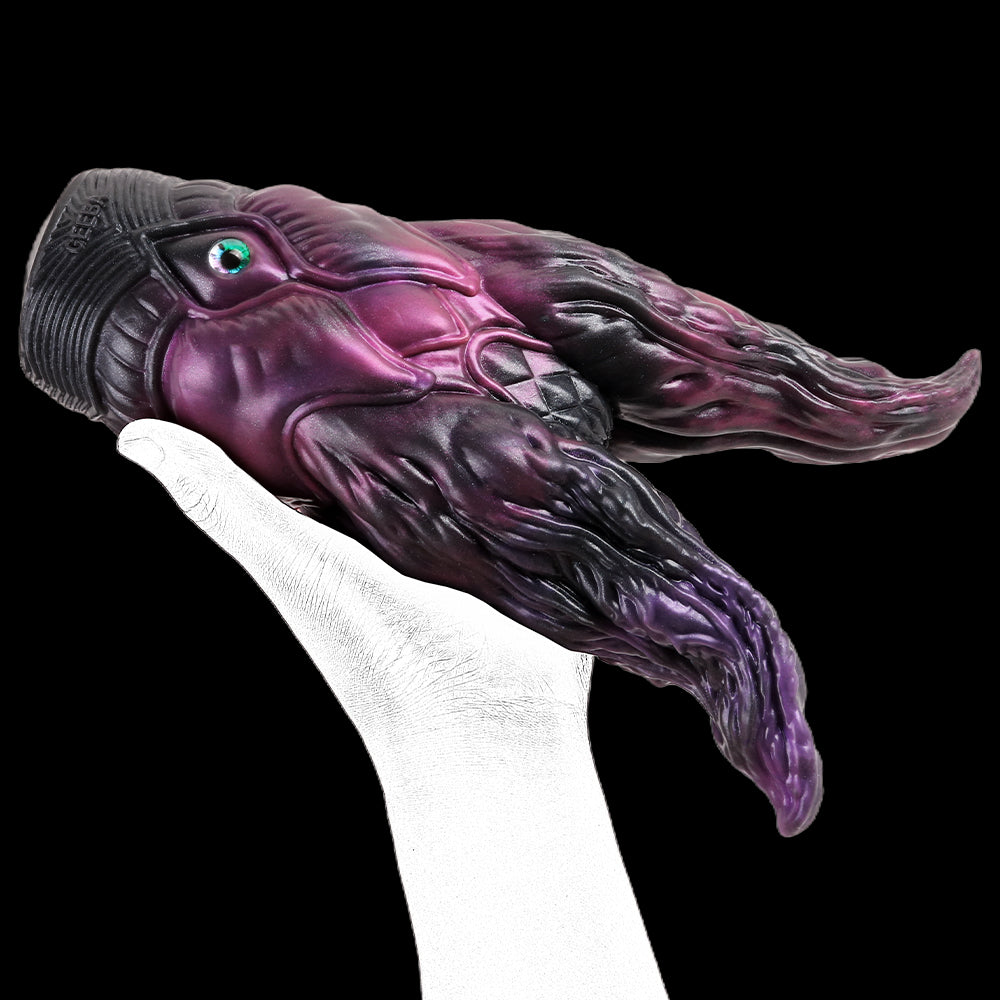 Octopus head with turquoise eye and purple-black tentacles