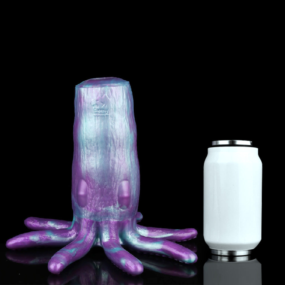 Purple-blue octopus masturbator with tentacles spread, plus white accessory cup