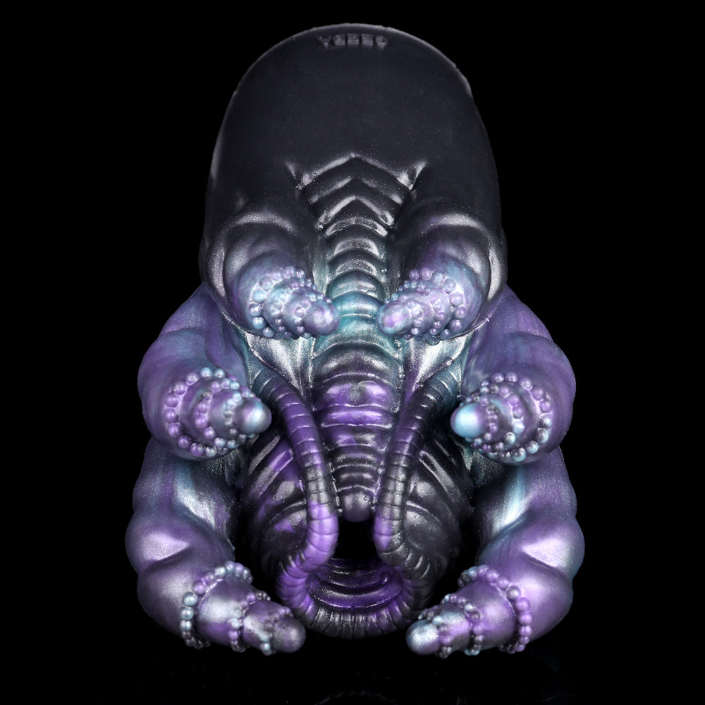 Octopus Hydra stroker, crouched front view with tentacle clusters and glowing eye