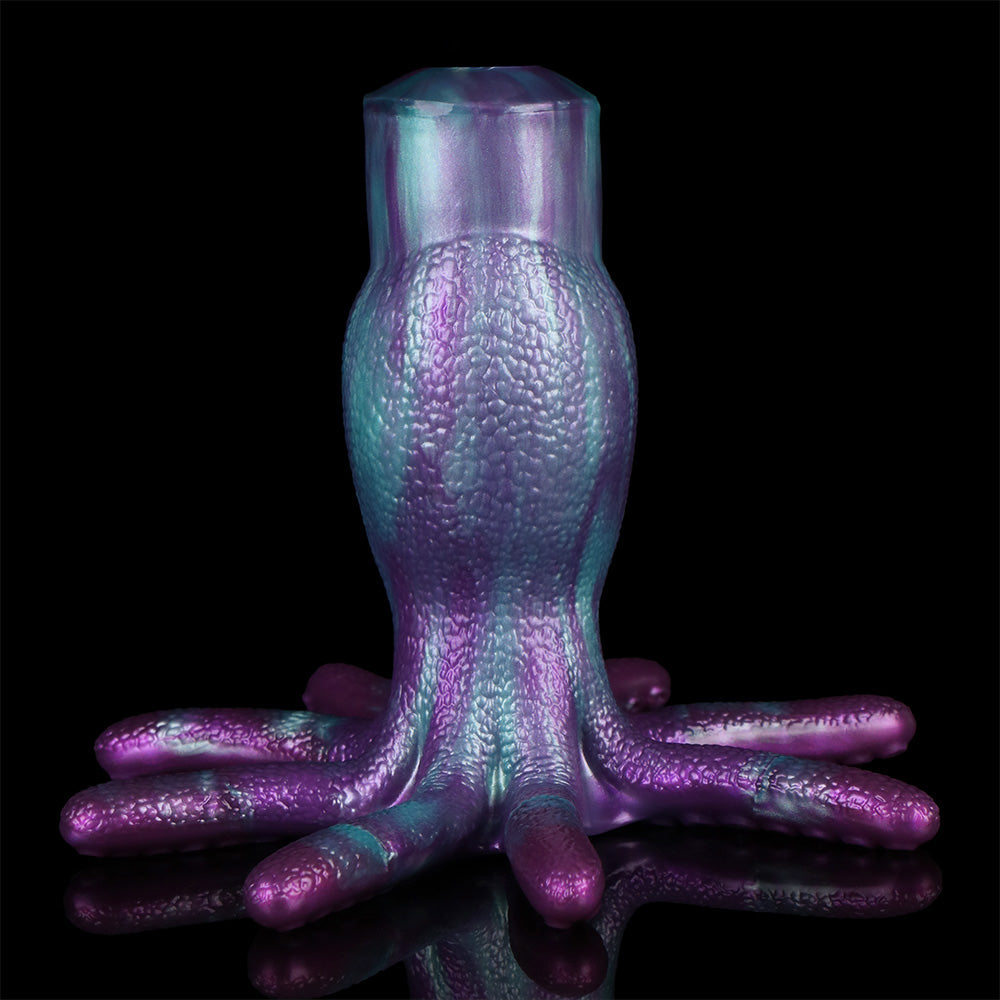 Front view of large octopus-style masturbator, purple textured body with 8 tentacles
