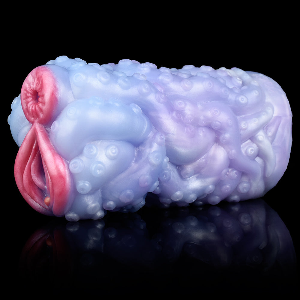 Octopus Orana dual-hole vibrator, angled view of blue tentacles with pink face detail