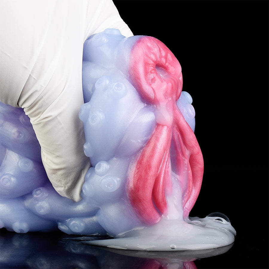 Light blue dual-hole fantasy sex toy with pink side insert and base paddle